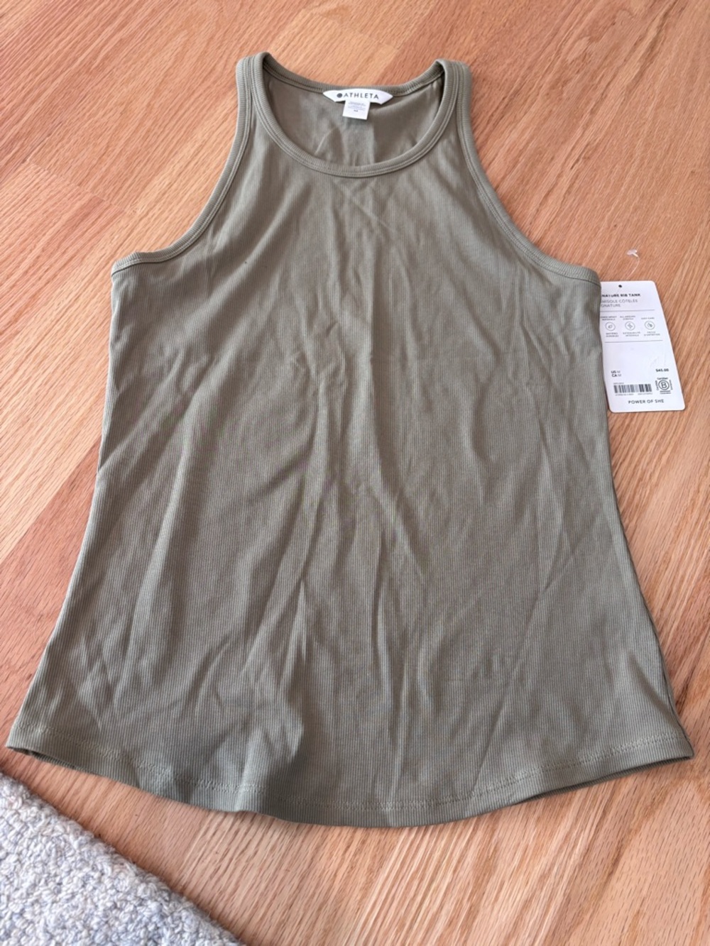 Athleta signature rib moss green high neck Tank top. SIZE M
NWT